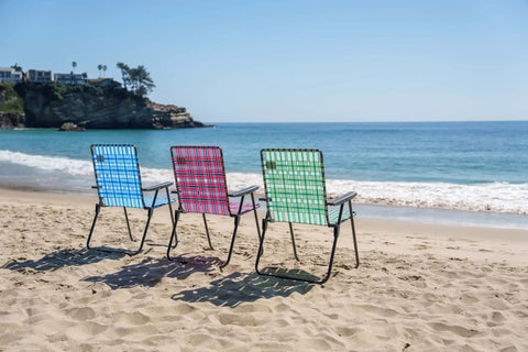 Retro Webbed Camping Chairs with Foldable Steel Frame, Old School Red White and Blue Stripes, on a Beach