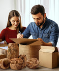 People packaging items with packing paper for moving and shipping, bubble wrap alternative visible, no tape needed.