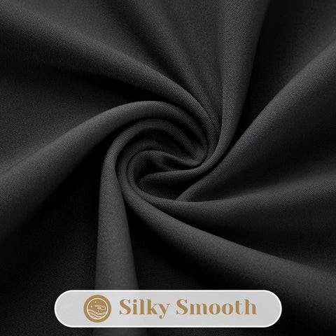 Close-up of Black Halloween Privacy Curtains Two Panels 52 By 72 Inches Light Filtering Window Drapes fabric texture