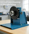 Dead Center 110V Rotary Welding Positioner Turntable With Iron Grip 2.5 Inch Three Jaw Chuck, side view on workbench.
