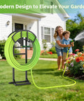 Garden Water Hose Holder And Freestanding Hose Reel Rack With Storage Basket Heavy Duty Metal Stand With 5 Spikes For Patio Yard And Lawn Holds 151 Feet Of Hose Black in garden setting