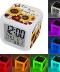 Total Game Changer Farmhouse Sunflower Butterfly Digital Cube Clock With Led Time Date Temp Readout, showing colorful light options.