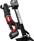 Heavy Duty Cordless Cable Puller Kit With 12 Ah Battery positioned on a sturdy frame, ideal for efficient wire pulling.