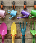 Heavy Duty Garage Hooks 4 Pack J Shaped Wall Mounted Hanger Organizer holding colorful watering cans and garden tools