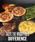 Woodridge Pro Electric Wood Pellet Grill And Smoker For Backyard Grillin with assorted food showing rich wood-fired flavor.