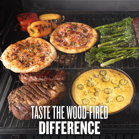 Woodridge Pro Electric Wood Pellet Grill And Smoker For Backyard Grillin with assorted food showing rich wood-fired flavor.