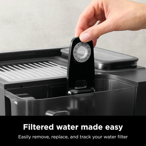 Premium Compatible Water Filter Housing With Quick Swap Charcoal Cartridge No Headache Setup showing charcoal filter tracker in use.