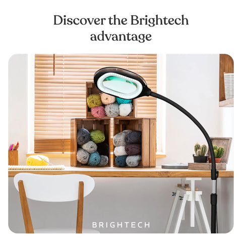 LightView Pro Magnifying LED Desk Lamp With Flexible Gooseneck And 3 In 1 Magnifier on a crafting desk
