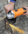 Powerful 6 Amp Angle Grinder Kit 4-1/2 Inch 11,000 RPM Metal Cutter in use cutting metal with sparks flying