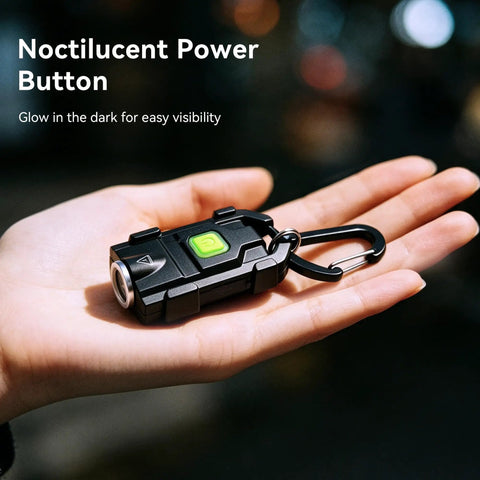 Ultra Bright 500 Lumen USB Rechargeable Small Flashlight Keychain Light with glowing power button held in a hand