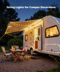 Solar Camping String Lights 33ft 100 LED With 9 Modes USB C Rechargeable on camper awning at night in garden setting