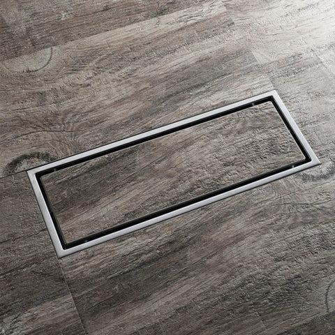 Top Shelf Game Changer 304 Stainless Steel Linear Floor Drain Rectangle Shower Tile Insert Hair Catcher Brushed Anti Odor Bathroom Grate Zero Clog Design on wood grain flooring.