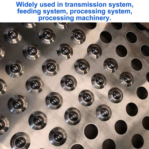 Close-up of Sixteen Pack Five Eighth Inch Roller Ball Transfer Bearings For Conveyor Systems on metal surface