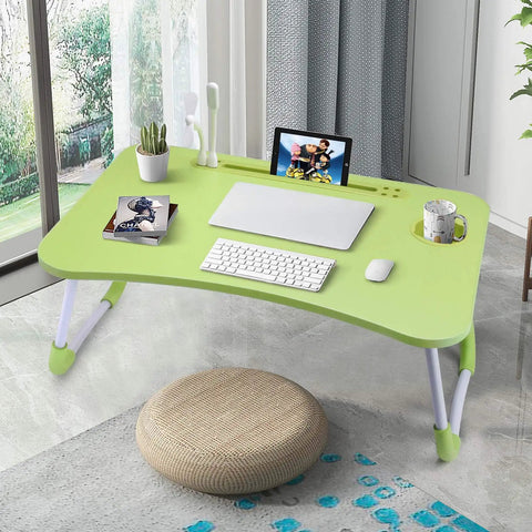 Foldable Laptop Desk Bed Table Portable Lap Tray for bed, couch, sofa or floor with green surface and adjustable legs, used as workspace.