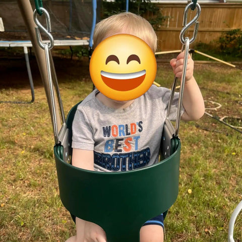 Toddler enjoying Toddler Swing With High Back Bucket Seat And 59 Inch Heavy Duty Iron Chains For Outdoor Indoor Swing Set Tree Straps Included Up To 300 Pounds Capacity Green