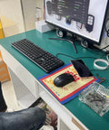 Antistatic Mat For Computer Repair And PC Building on desk with keyboard and monitor, ESD Safe Desk Pad For Electronics Lab
