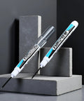 Top Shelf Four Pack Bold White Oil Based Permanent Markers Featuring Slick Quick Dry Ink And Razor Fine Nibs on concrete background.