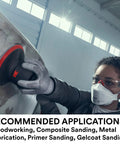Worker using Xtract Net Disc 710W 6 Inch Hook And Loop Sanding Disc on metal surface, showcasing dust-free sanding with protective gear.