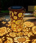 Sunflower Solar Lanterns Outdoor Waterproof Hanging Lights casting floral shadows in garden with vintage cutout for cozy ambience