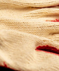 Close-up of Economical String Knit Latex Dipped Palm Gloves With Nitrile Coated Fingers For General Purpose Work, showing knit texture.