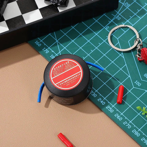 Top Shelf Emergency Essentials For Your Daily Driver Solid Compact Auto Fire Suppressor With Instant Aerosol Activation 10 Gram Kit on a workspace.