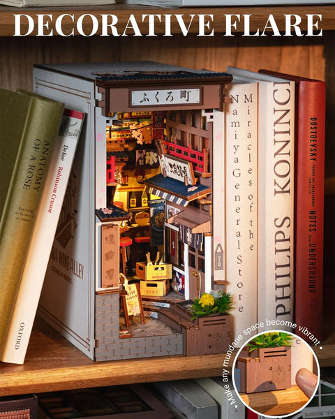 Front view of Sakura Wine Alley Japanese Book Nook Kit for Adults and Teens, DIY 3D Wooden Miniature House Puzzle on a bookshelf.