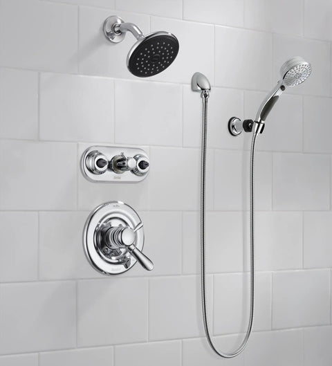 9-Spray Touch-Clean Handheld Shower Head with hose wall mount chrome finish, shown installed on white tile bathroom wall