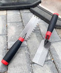 Two Pack Carbon Steel Margin Trowel Set With Flat And Square Notch Trowels For Masonry Flooring Drywall Concrete And Tile Work Built Tough With Anti Rust Handles And Ergonomic Comfort Grip Pro Grade Tool Kit resting on tiles