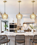 Top Shelf Amber Glass Pendant Light With Vintage Gold Trim For Kitchen Island And Dining Area height adjustable in modern kitchen.