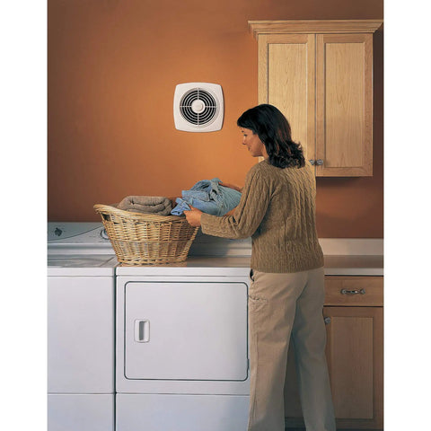 Laundry room with woman and Through The Wall Ventilation Fan With Built In Exterior Cap And On Off Switch For Home Use, 8 Inch Duct