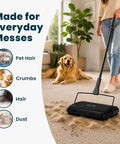 Grab And Go No Sweat Manual Sweeper For Carpets Hardwood And Rugs Triple Brush picks up pet hair and crumbs on carpet.