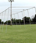 Outdoor Indoor Batting Cage Frame Kit 55 X 14 X 12 Inches With 1-1/2 Inch Steel Frame Corners set up in a grass field