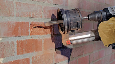 1 Inch By 12 Inch Flat Chisel For SDS Max Hammers, Concrete Removal And Hard Surface Break Up in use on brick surface