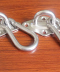 Beefy 1000 Lb Capacity Hammock Hanging Kit With Ultra Durable Stainless Steel Carabiners And Hooks on wooden surface