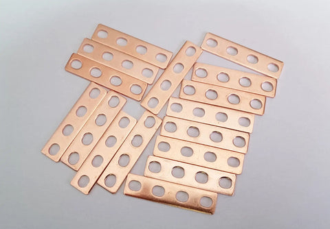 Top Shelf 16 Piece Purple Copper Battery Bus Bar Connection Plates For 5.5 6.2 And 6.9 Ah Lithium Cells, showing 16 copper plates with four holes each.