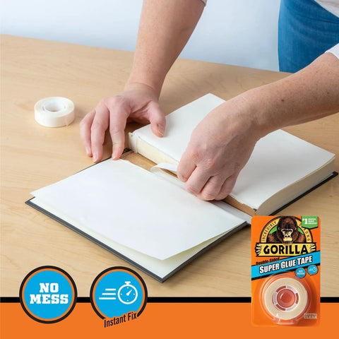 Heavy Duty Double Sided Glue Tape For Quick Fixes And Permanent Bonding, used for repairing a book, showing easy-tear application.