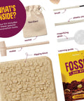 Hands-On Fossil Dig Kit For Kids Aged 8 To 12, Uncover 12 Real Fossils With An Illustrated Guide, A STEM Science Adventure For Boys And Girls, Easy To Use At Home, Educational, Engaging And Totally Fun. Includes digging block, mallet, brush, chisel, magnifier, sachet and guide.
