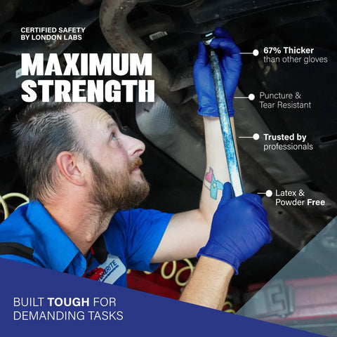Built Tough 5 Mil Thick Nitrile Exam Gloves In Sharp Cobalt Blue Disposable Latex Free Protective Handwear For Health Professionals Emt Teams And Food Prep Straight Up Mega Bundle Of One Thousand Count worn by a mechanic working under a vehicle.