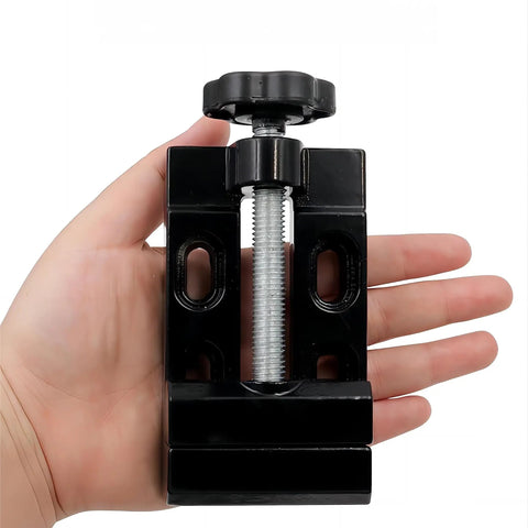 Person holding Mini Bench Vise Clamp with Aluminum Alloy Construction for Pro Grade Precision Drilling and Small Repairs, Flat Clamp.