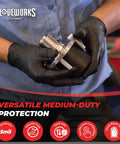 Front view of hands in GLOVEWORKS black nitrile gloves gripping a metal connector.