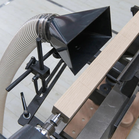 Heavy Duty Universal Woodturning Dust Hood Featuring Fully Adjustable Bracket And 100 Millimeter Hose Connector for capturing dust while shaping timber.