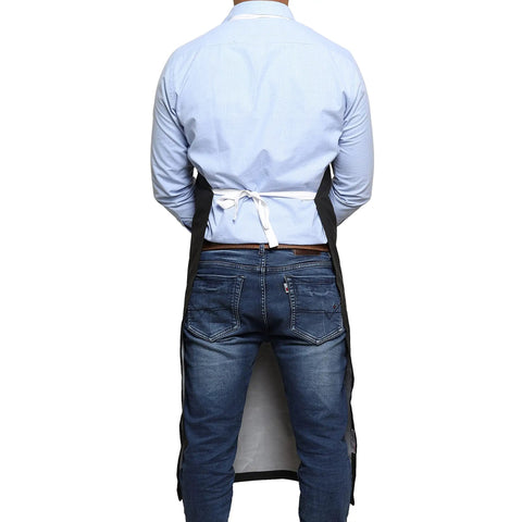 Back view of person wearing 25 Pack Rubber Vinyl Aprons Large 27W X 42L Waterproof Pro-Grade Halter Bib Aprons For Dishwashing Butcher Lab