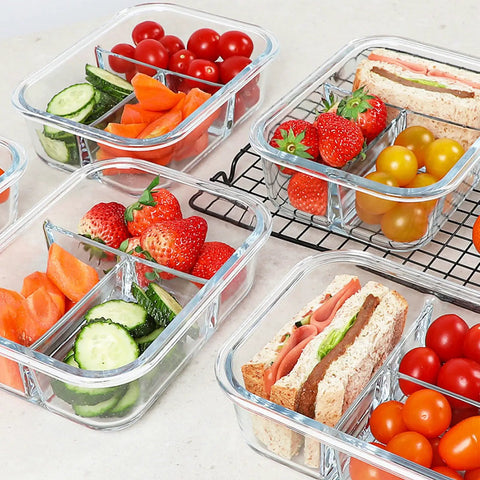Glass Meal Prep Containers With 3 Compartments, 36 Oz, 5 Pack, filled with fruits and sandwiches on a countertop.