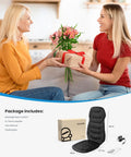 Two women exchanging a gift with Back Massager With Heat And Vibration, Seat Cushion With 8 Massage Nodes And 5 Modes packaging underneath.