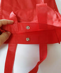 Red fabric with sew-on snap buttons from 120 Sets Sew On Snap Buttons Metal Fasteners For Clothing Repair And DIY Sewing 8mm 10mm 13mm Sizes Stainless Steel Rust Resistant Easy Press On Includes 50 8mm 50 10mm 20 13mm Sets In Silvery Finish.