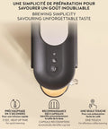Top view of Vertuo Up Coffee And Espresso Maker With Aeroccino Milk Frother By Breville, featuring cup and control buttons.