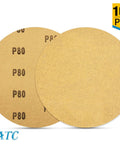 Front view of 6-inch PSA sanding discs, 80 grit aluminum oxide, adhesive-backed, pack of 100.