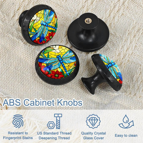 Colorful dragonfly pattern ABS cabinet knobs with glass crystal covers on fabric background.