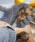 3 Pairs Cut Resistant Gloves HDPE Food Grade Level C EN388 for kitchen prep, shucking oyster with knife on a cutting board