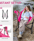 Woman using Padded Oversized Hammock Camping Chair With Multi Storage Pockets, Portable Foldable Rocking Swing Chair, Pink by river